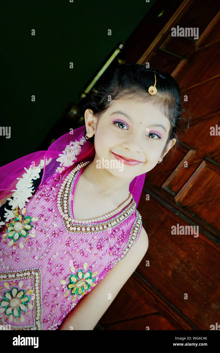 Indian girl smiling at camera hi-res stock photography and images - Alamy