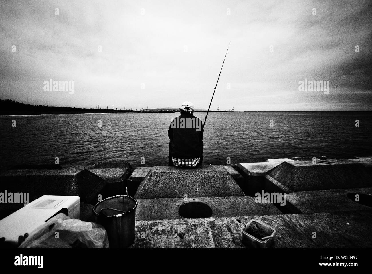 Rear view silhouette man standing Black and White Stock Photos & Images ...