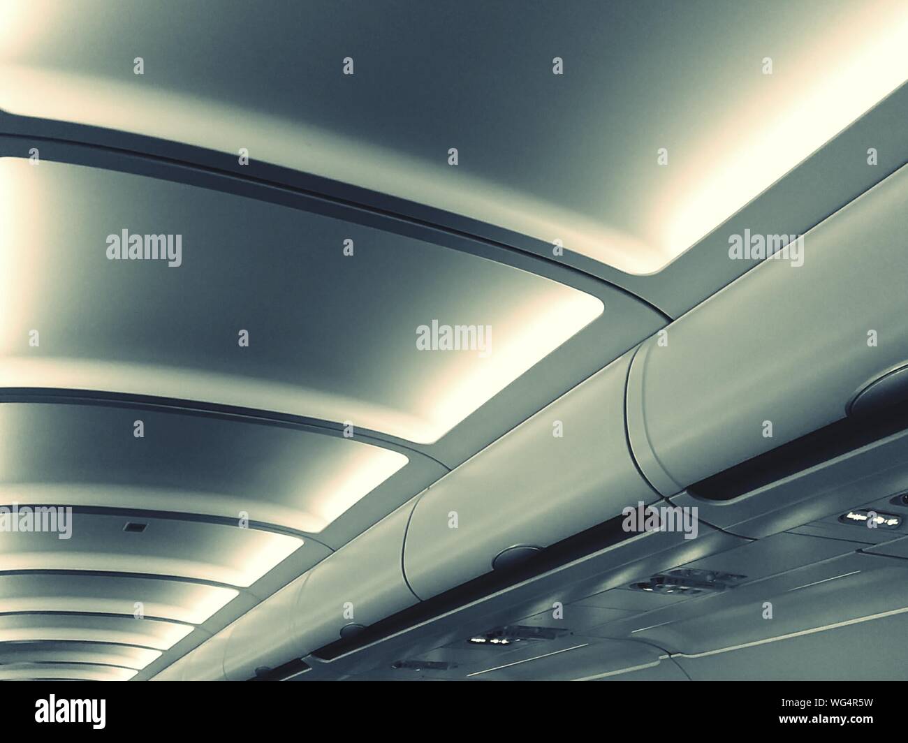 Overhead Compartment In Airplane Stock Photo Alamy
