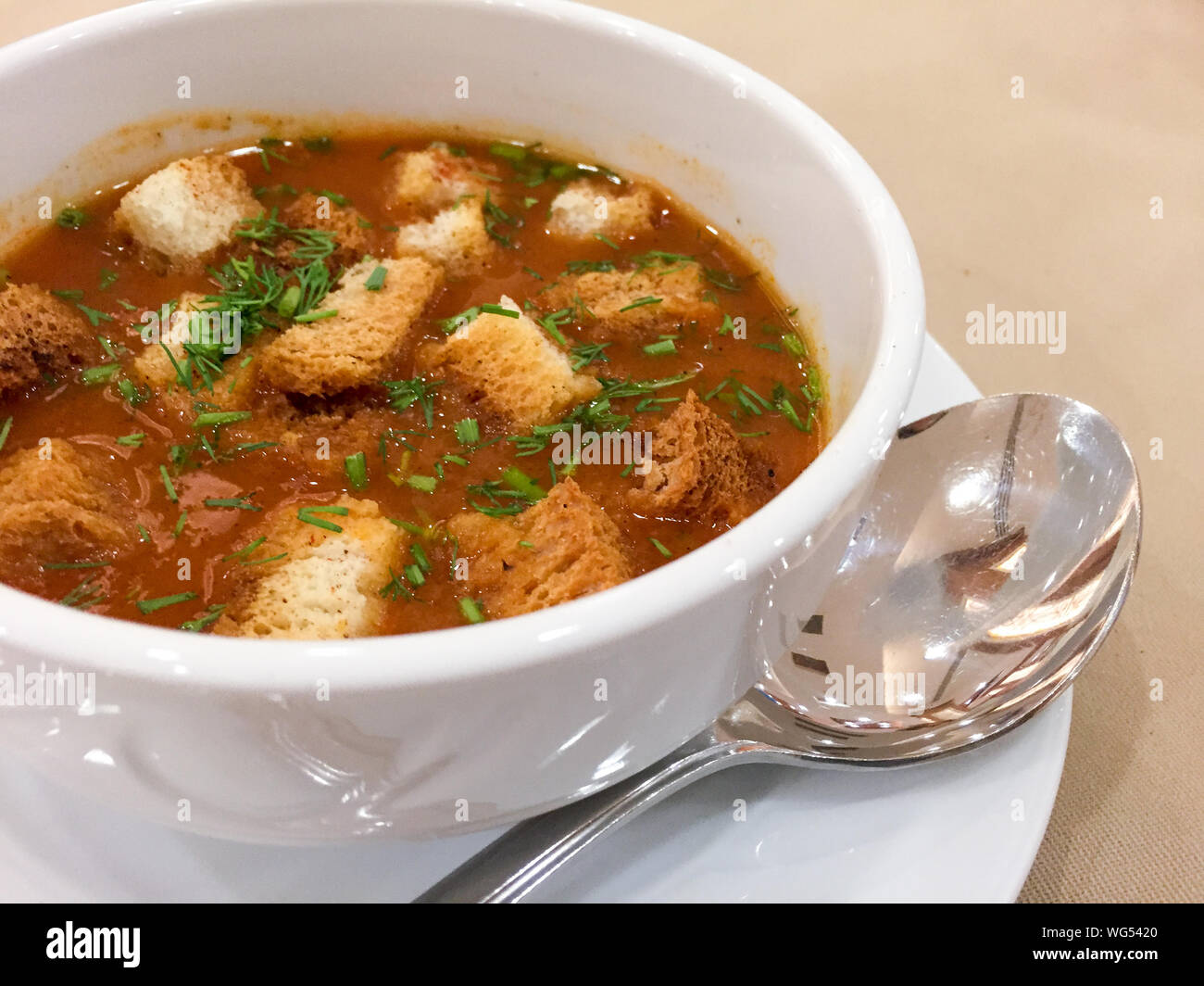 High Angle View Of Soup With Crouton In Bowl On Table Stock Photo