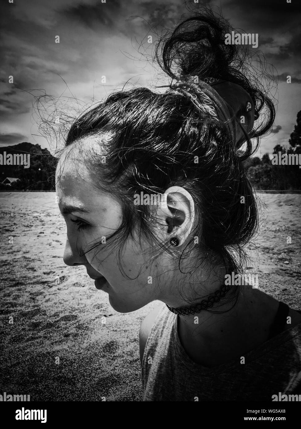 Woman messy hair bun Black and White Stock Photos & Images - Alamy