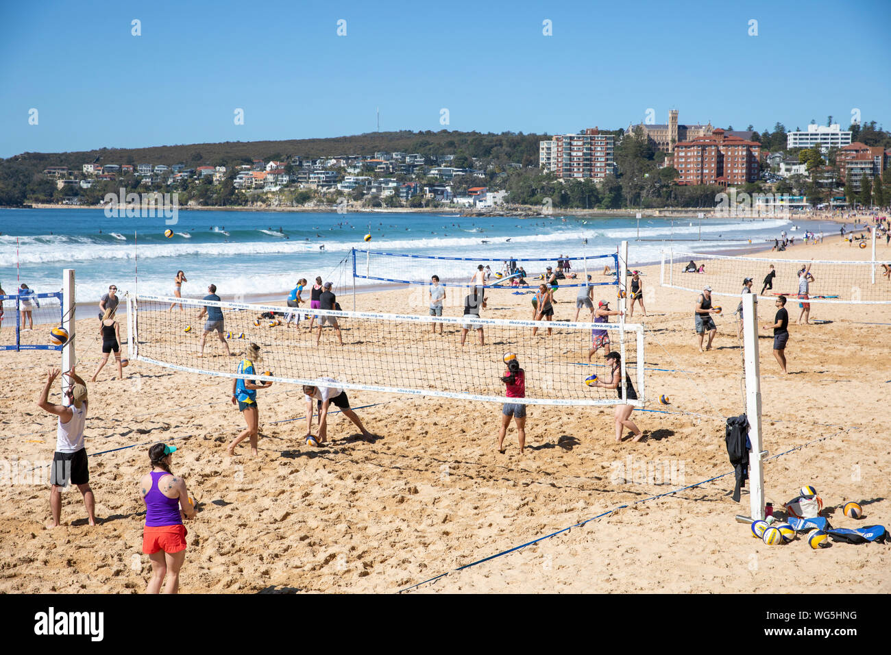 People playing beach volleyball on Manly beach in Sydney northern beaches,NSW, Australia Stock Photo