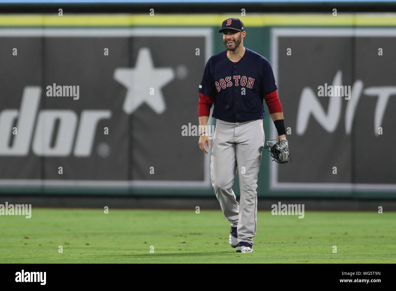 August 30, 2019: Boston Red Sox left fielder J.D. Martinez (28) laughs after falling down fielding a fly ball to right during the game between the Boston Red Sox and the Los Angeles Angels of Anaheim at Angel Stadium in Anaheim, CA, (Photo by Peter Joneleit, Cal Sport Media) Stock Photo
