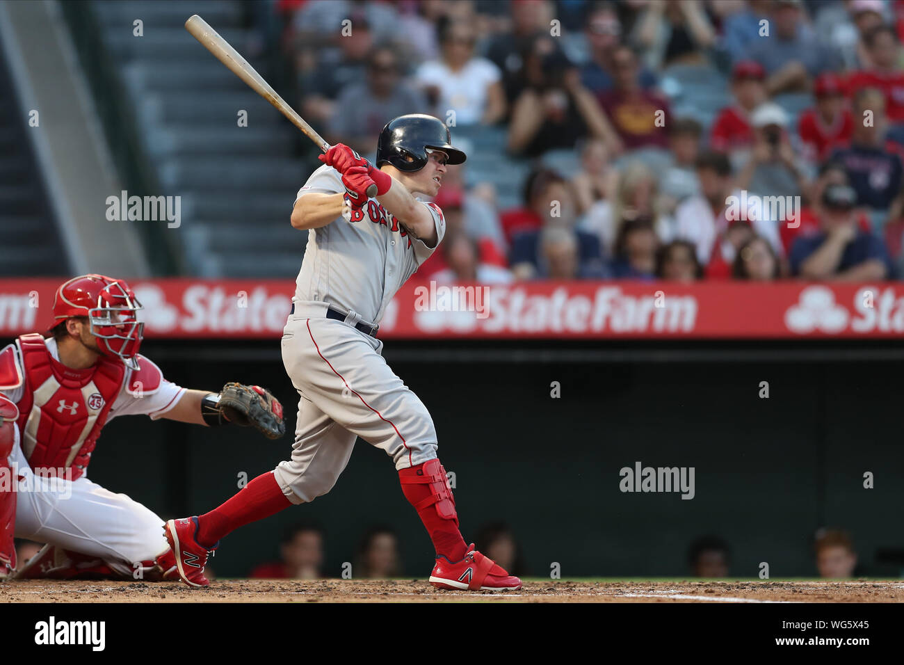 Anaheim, USA. 31st Aug, 2019. August 31, 2019: Boston Red Sox second baseman Brock Holt (12) singles during the game between the Boston Red Sox and the Los Angeles Angels of Anaheim at Angel Stadium in Anaheim, CA, (Photo by Peter Joneleit, Cal Sport Media) Credit: Cal Sport Media/Alamy Live News Stock Photo