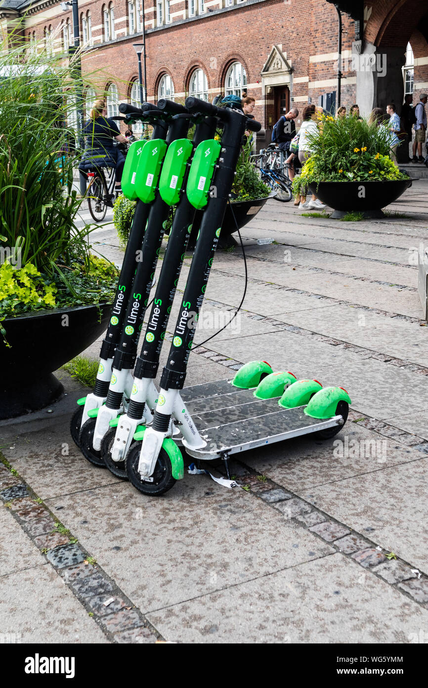 rental Electric E scooter , escooter, e-scooter on sidewalk in Kopenhagen -  August 2019 - Kopenhagen, Denmark, Europe Stock Photo - Alamy