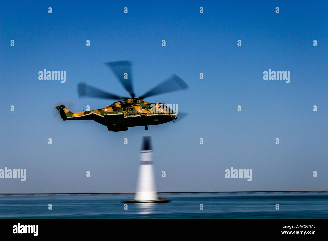 Helicopter Flying In The Distance High Resolution Stock Photography and  Images - Alamy