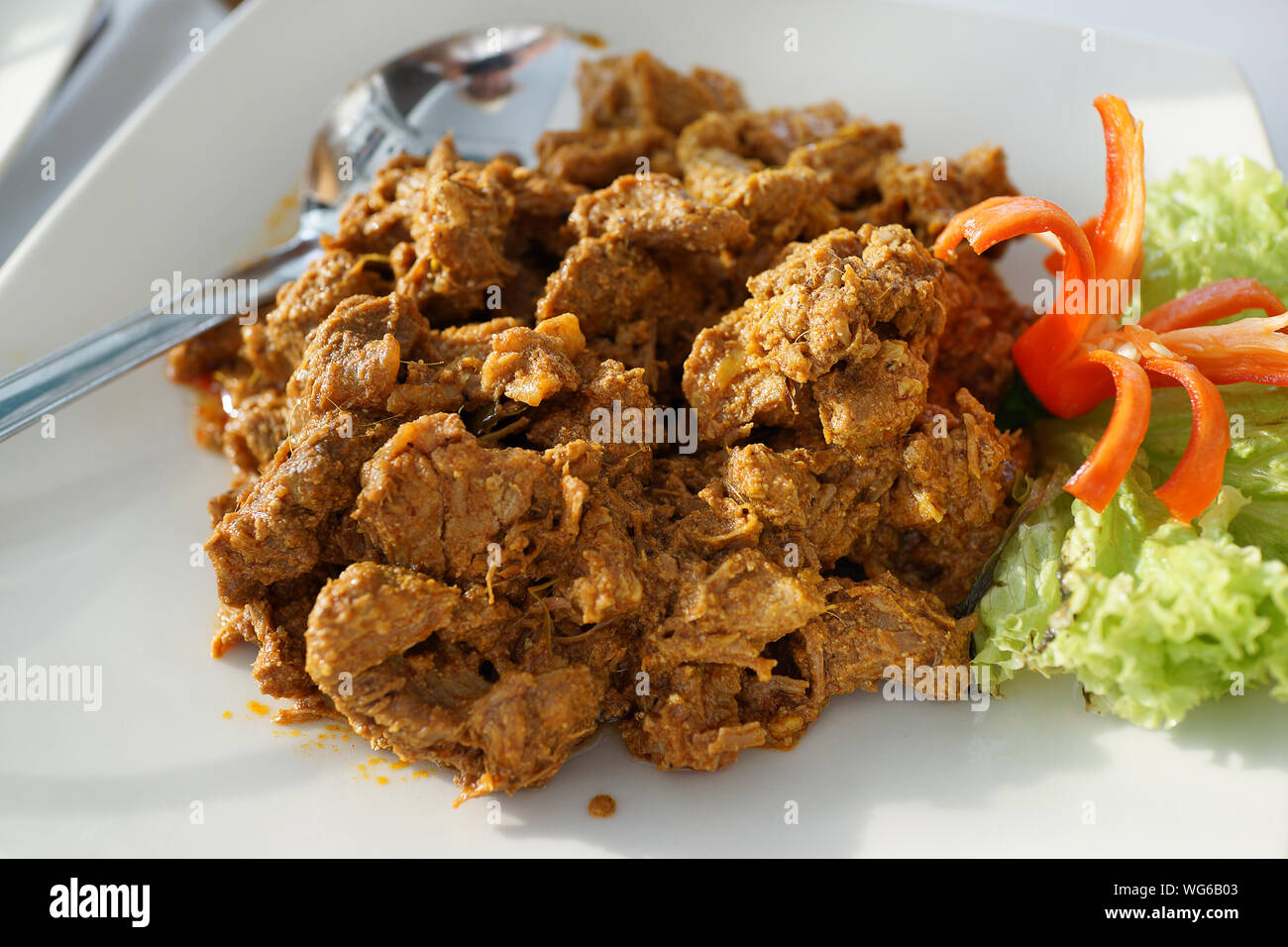 High Angle Close-up Of Beef Rendang Served In Plate Stock Photo