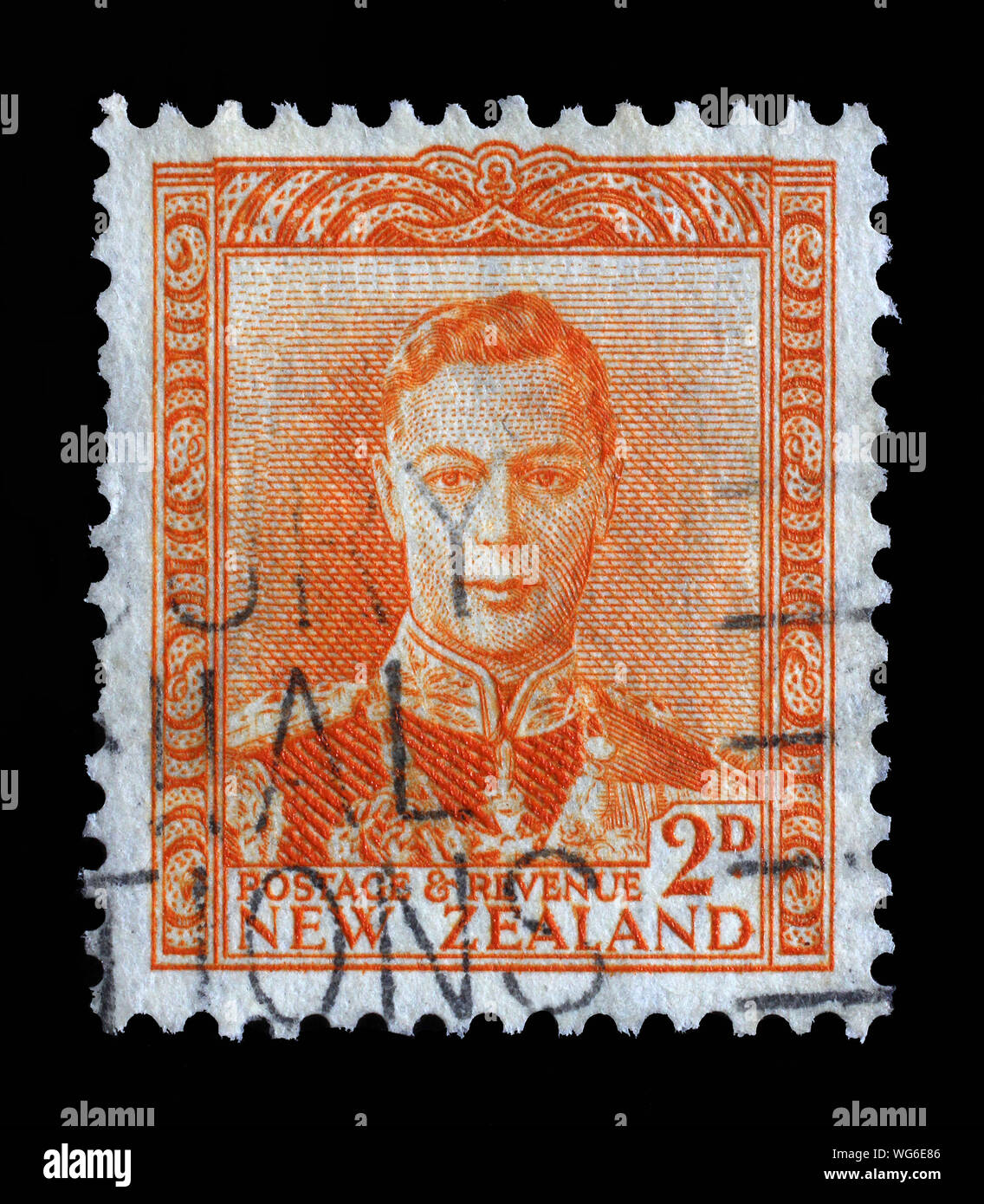 Stamp issued in New Zealand shows King George VI, circa 1947. Stock Photo