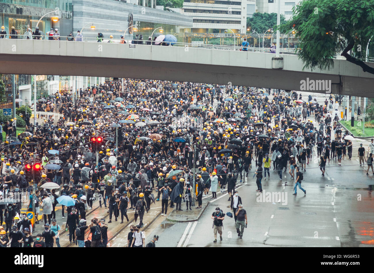 Hong Kong, 31 Aug 2019 - Hong Kong protest crowd as black bloc in Admiralty Stock Photo