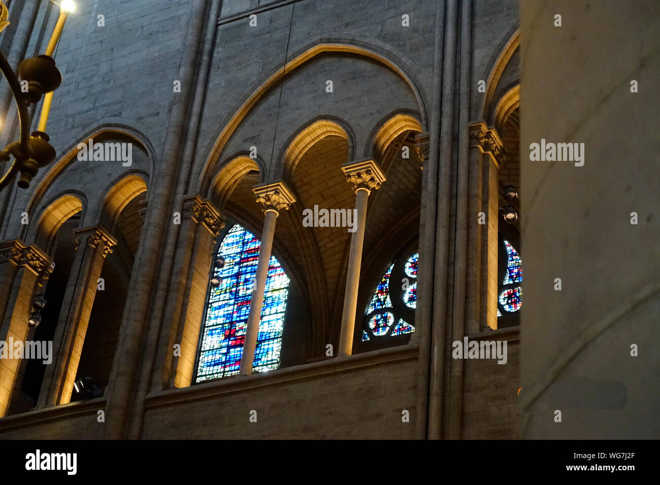 Low Angle View Of Pillars Against Stained Glass Windows Stock Photo Alamy