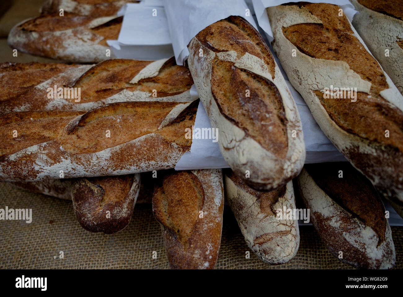 Loaves Of Bread On Burlap Stock Photo