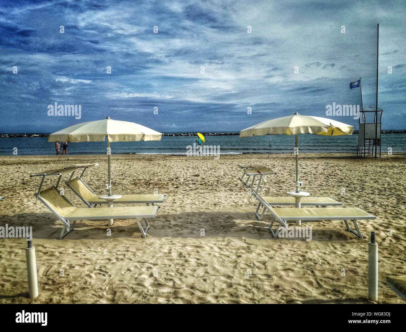 Women on deck chairs beach hi-res stock photography and images - Alamy