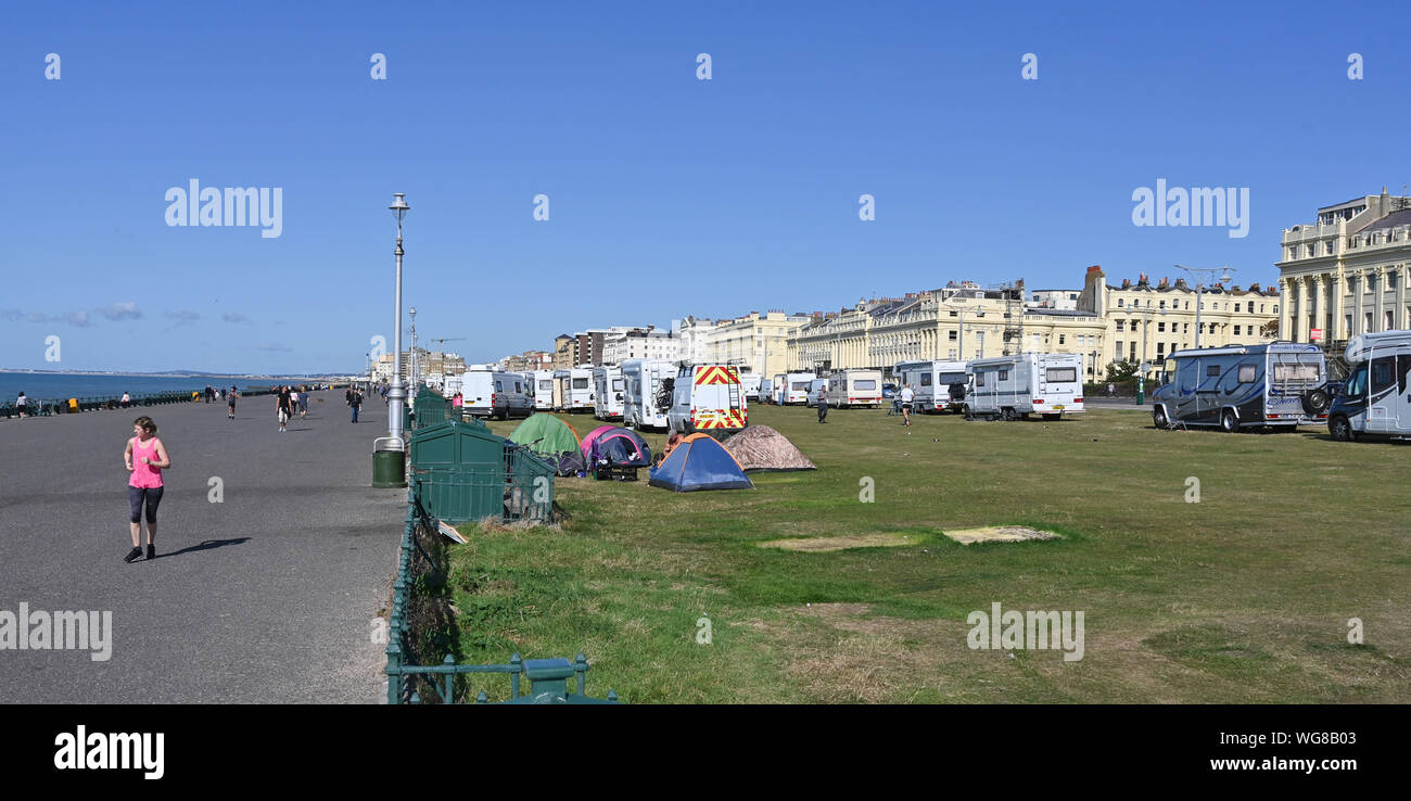 Brighton, UK. 1st September 2019.  An encampment of travellers has arrived on Hove Lawns in Brighton with about 50 vehicles parked on the seafront . The camp has arrived over the weekend and is where a group of homeless are also living in tents . Credit : Simon Dack / Alamy Live News Stock Photo