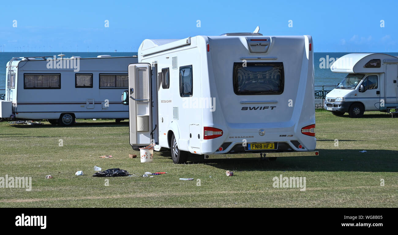 Brighton, UK. 1st September 2019.  An encampment of travellers has arrived on Hove Lawns in Brighton with about 50 vehicles parked on the seafront . The camp has arrived over the weekend and is where a group of homeless are also living in tents . Credit : Simon Dack / Alamy Live News Stock Photo