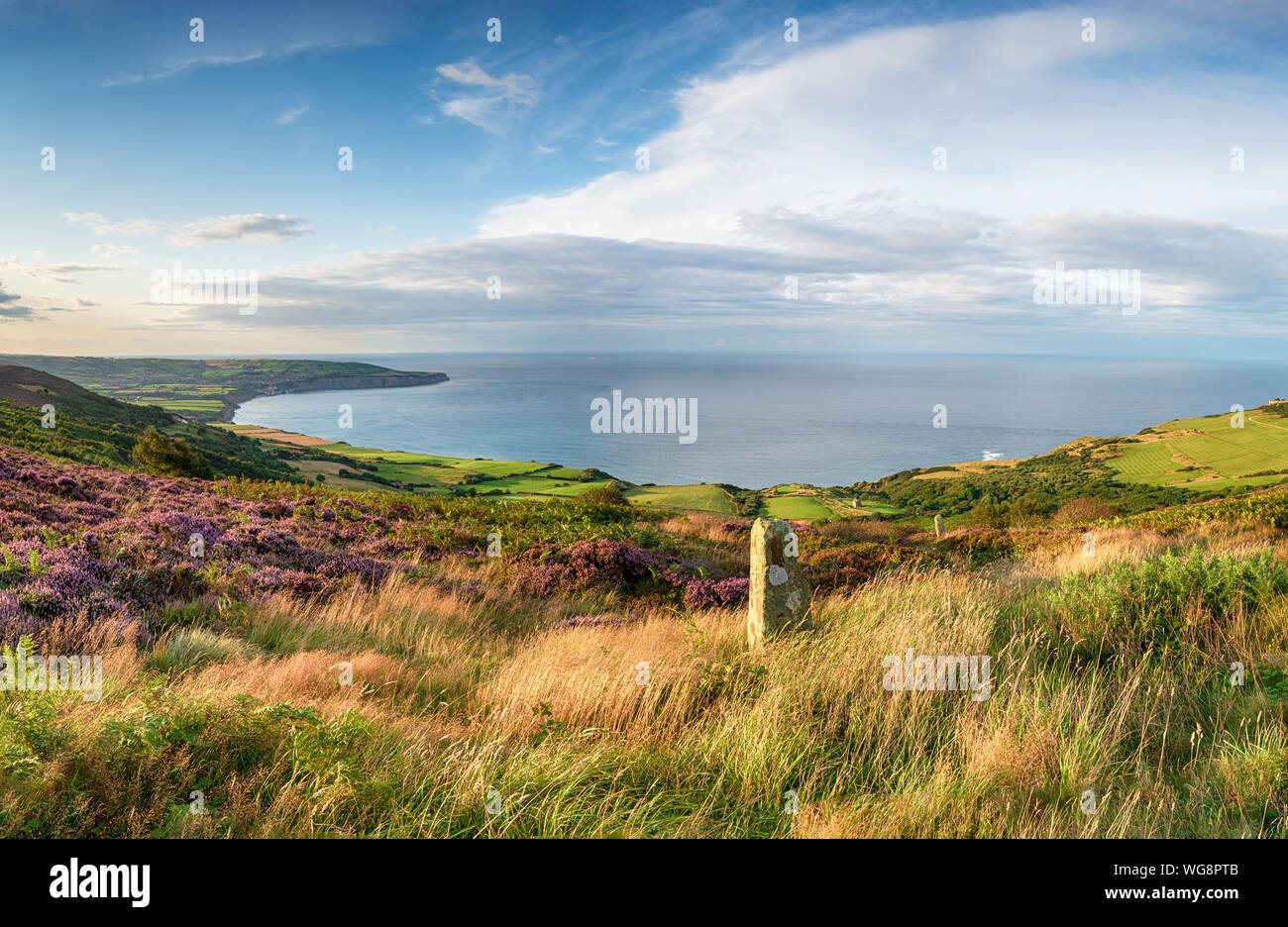 Summer on the North Yorkshire coast with Robin Hood's Bay to the left and Ravenscar on the right Stock Photo