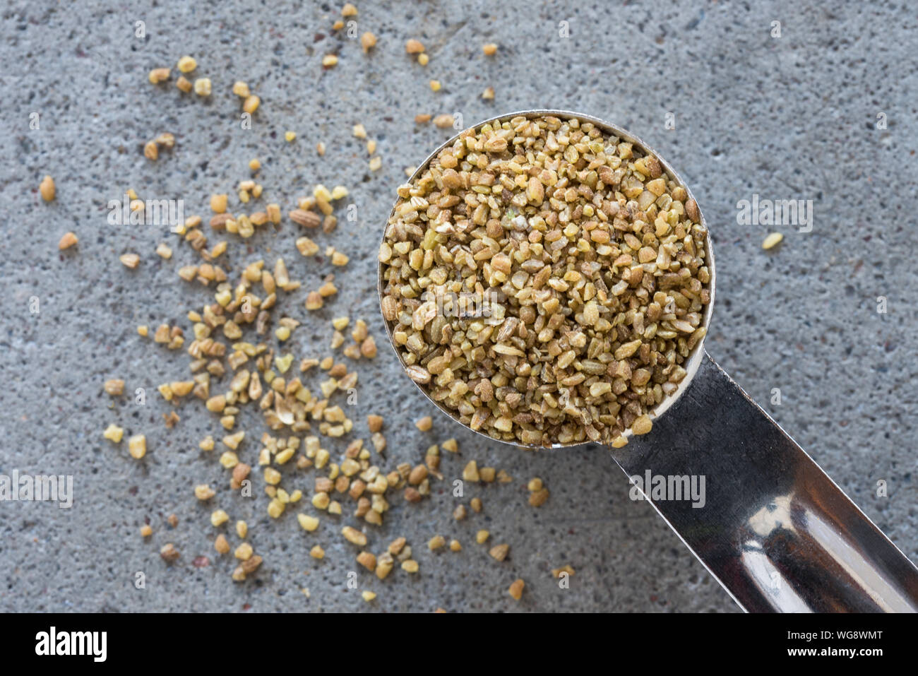 High Angle View Of Spice In Teaspoon Stock Photo