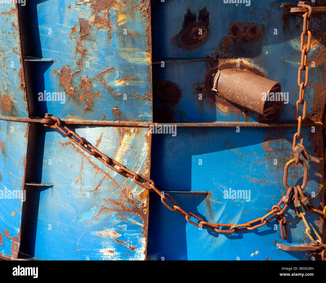 abstract blue part of rusty sheep hull and metal chain Stock Photo - Alamy