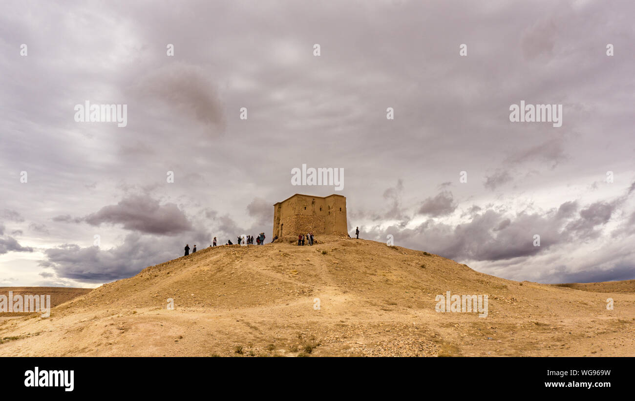 Low Angle View Of Ancient House On Hill Against Sky Stock Photo