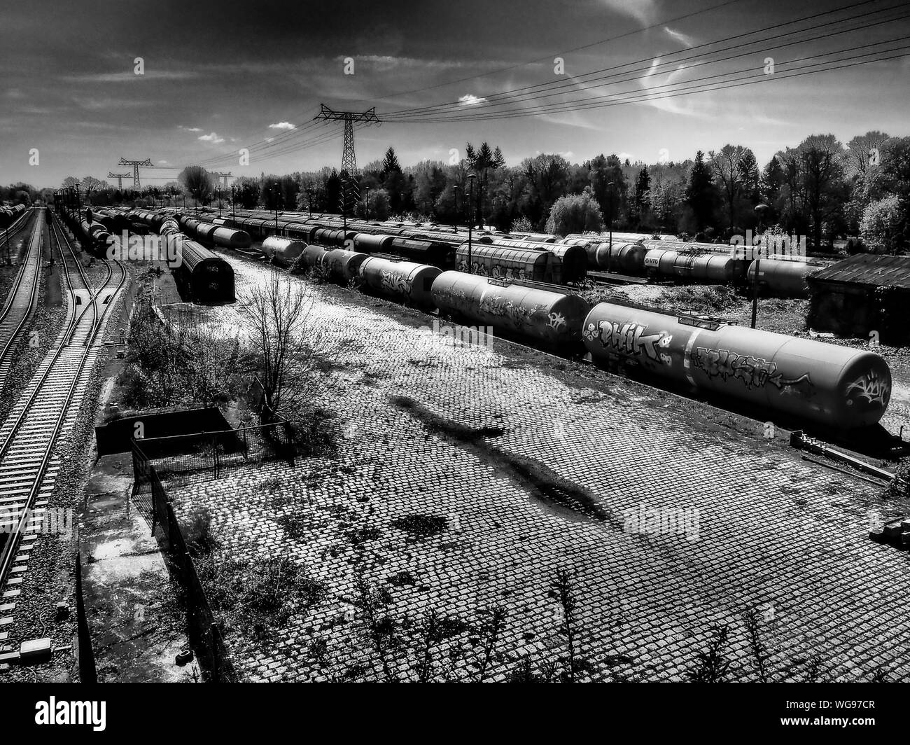Oil Tankers At Shunting Yard Against Sky Stock Photo