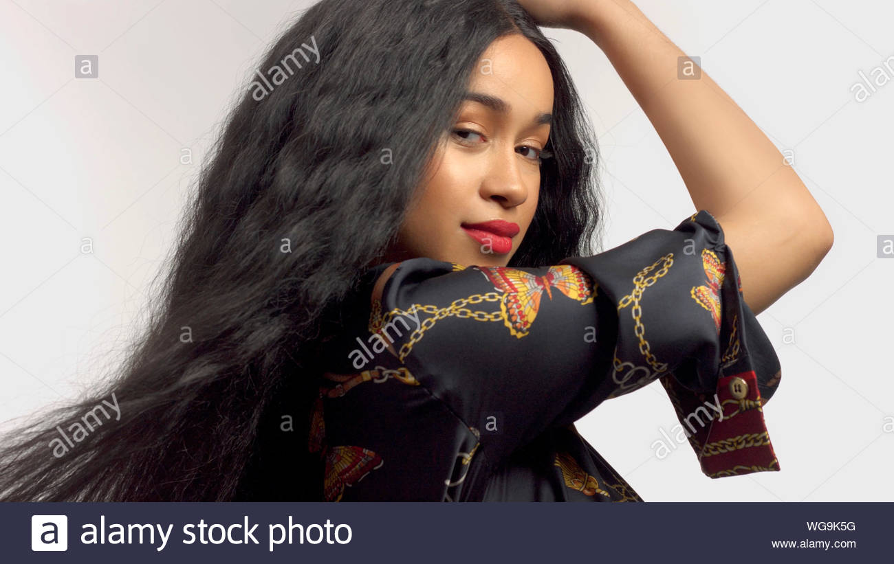 Gorgeous Mixed Race Model In Studido Shoot With Long Wavy Wig On