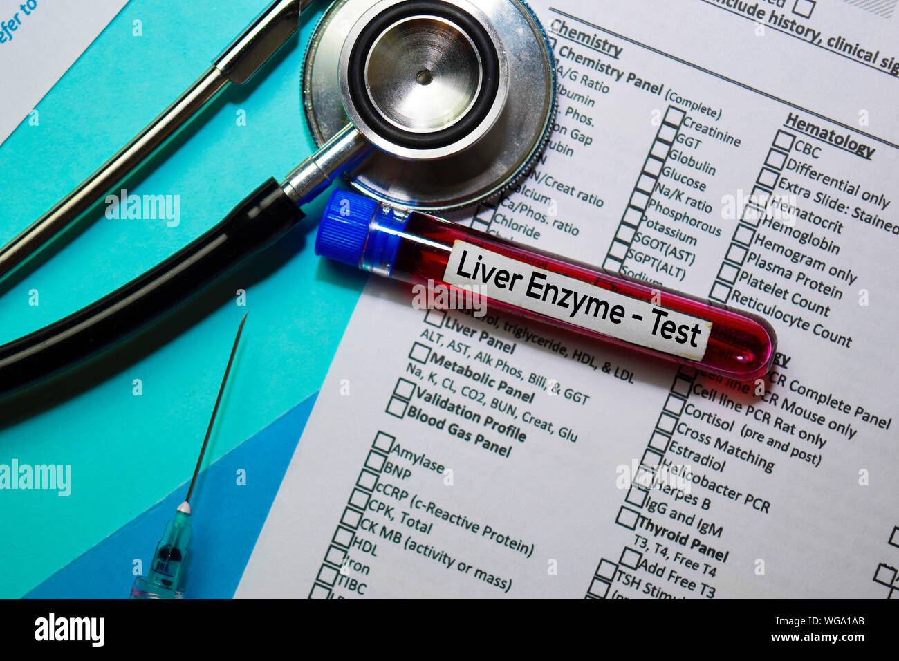 Liver Enzyme Test with blood sample. Top view isolated on office desk. Healthcare/Medical