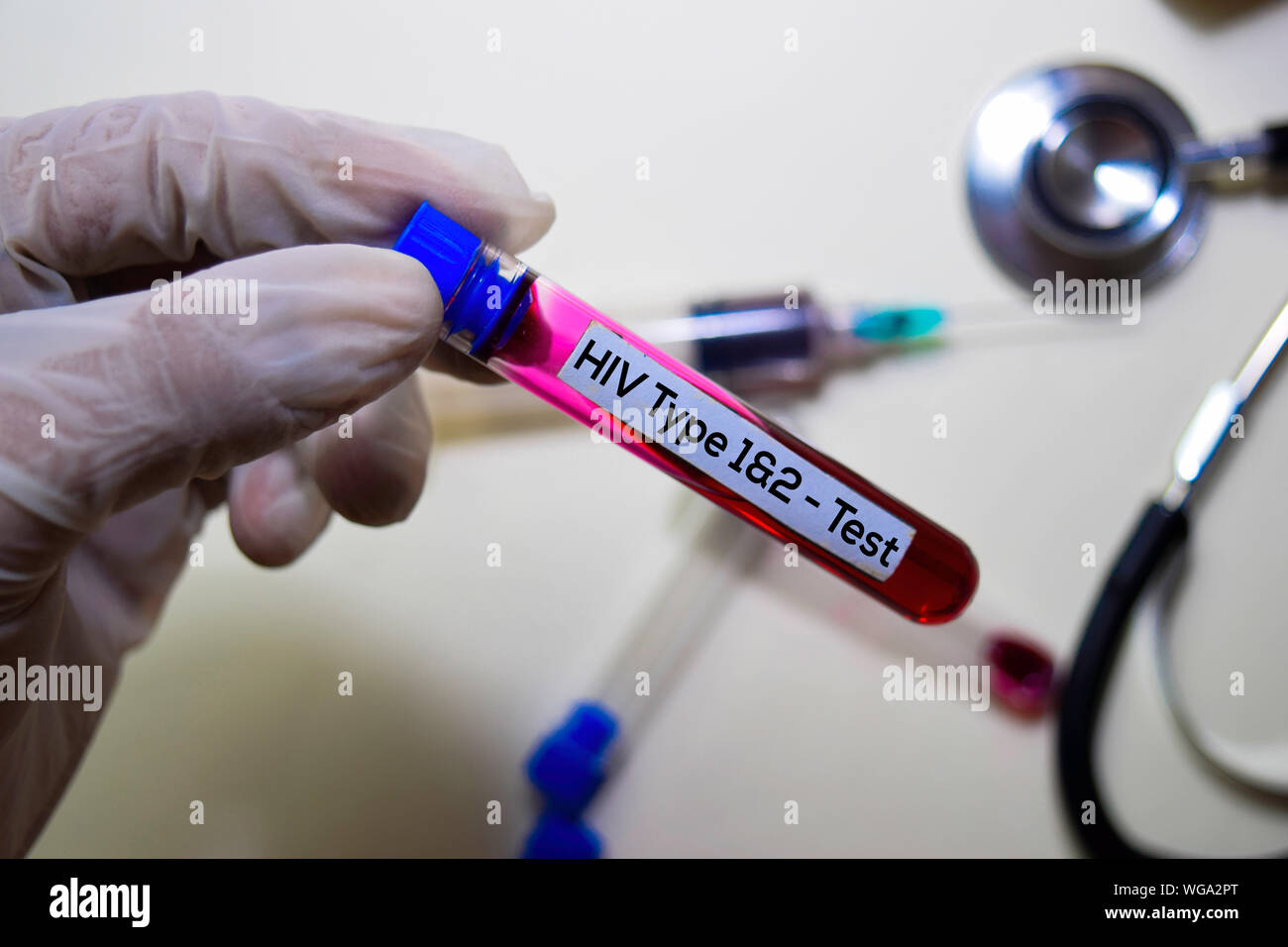 HIV Type 1 & 2 - Test with blood sample. Top view isolated on office ...