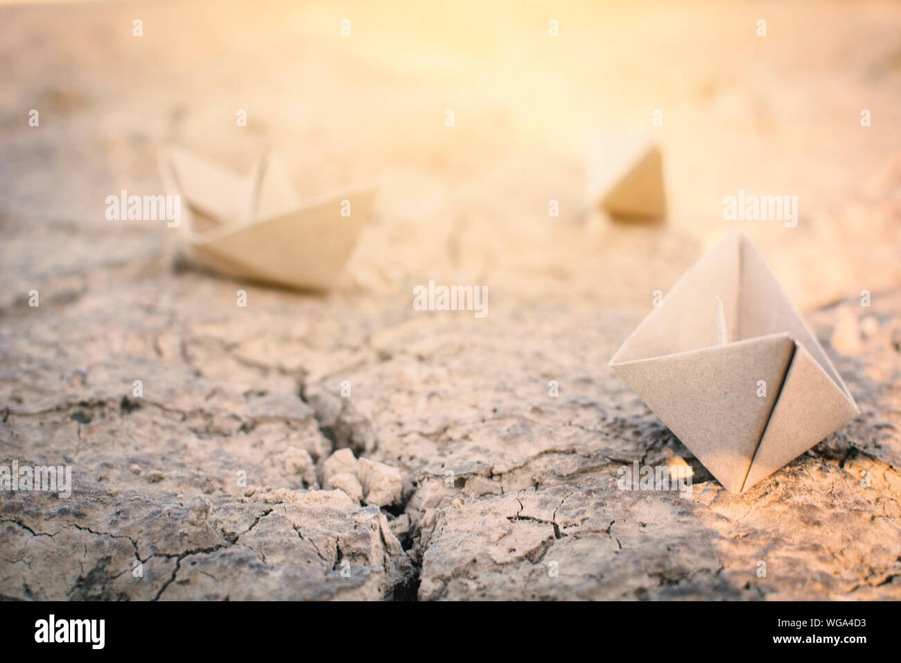 Close-up Of Paper Boat On Ground Stock Photo