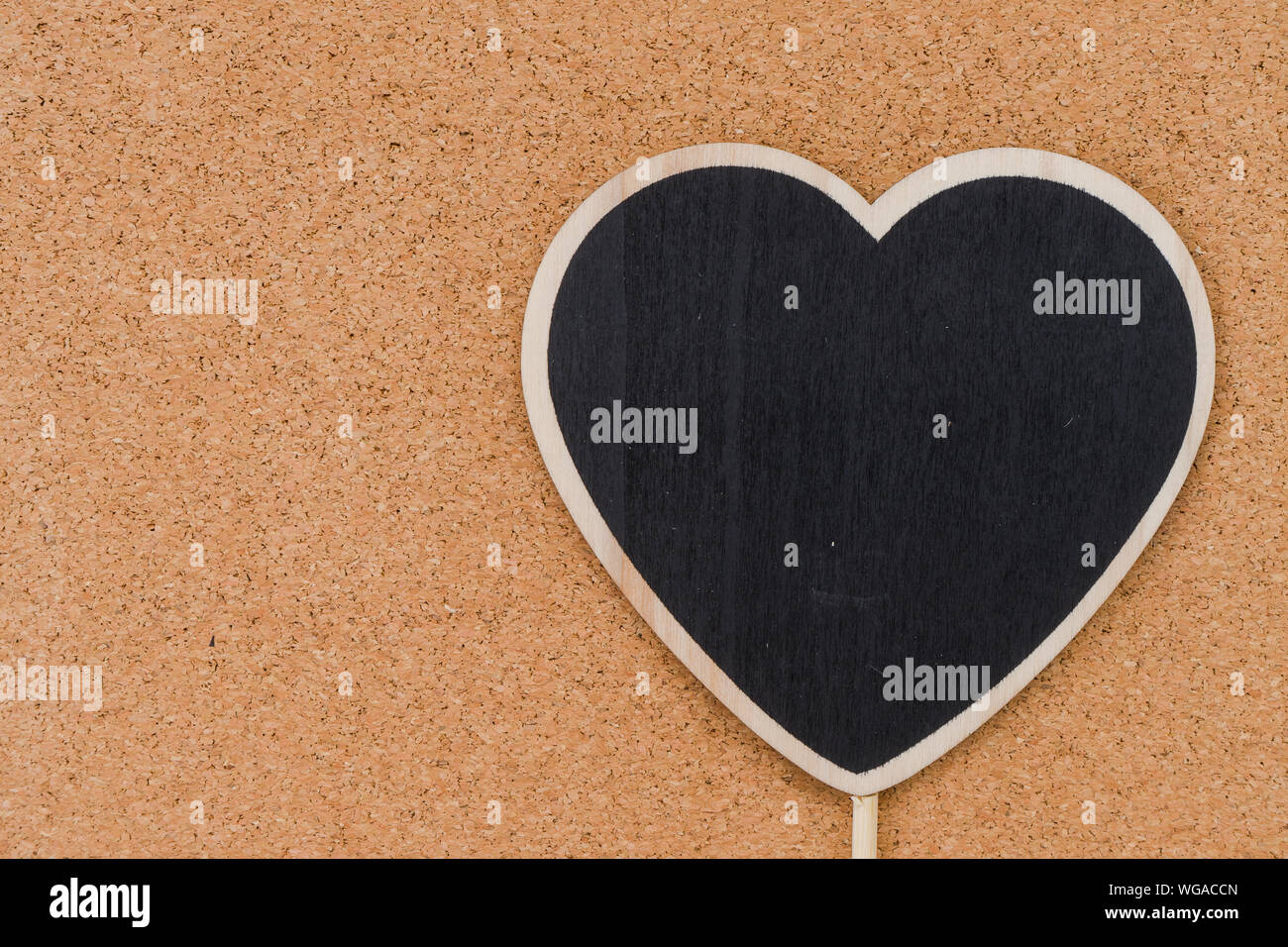 Close-up Of Black Heart Shape On Table Stock Photo