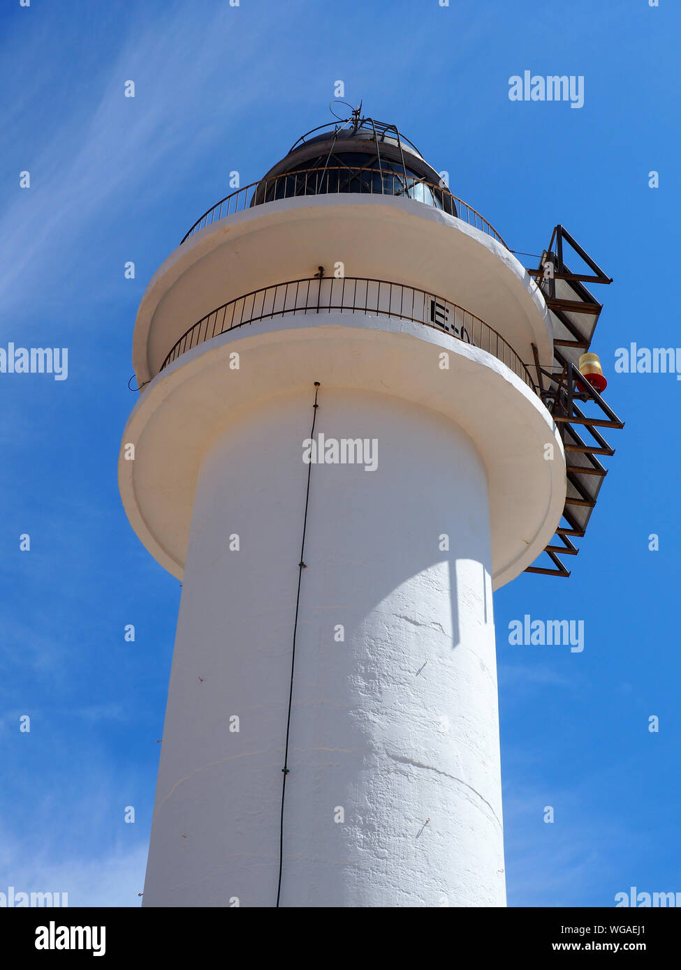 Low Angle View Of Lighthouse Against Blue Sky Stock Photo