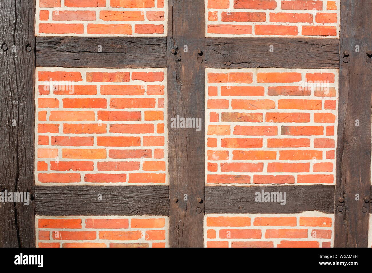 Ziegelmauer mit Fachwerk-Balken, Deutschland, Europa Stock Photo