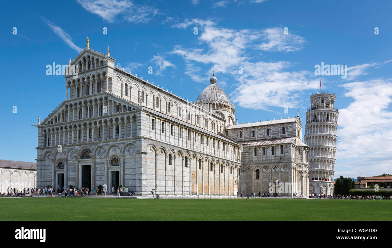 Cattedrale Di Pisa And Leaning Tower Of Pisa Against Sky Stock Photo