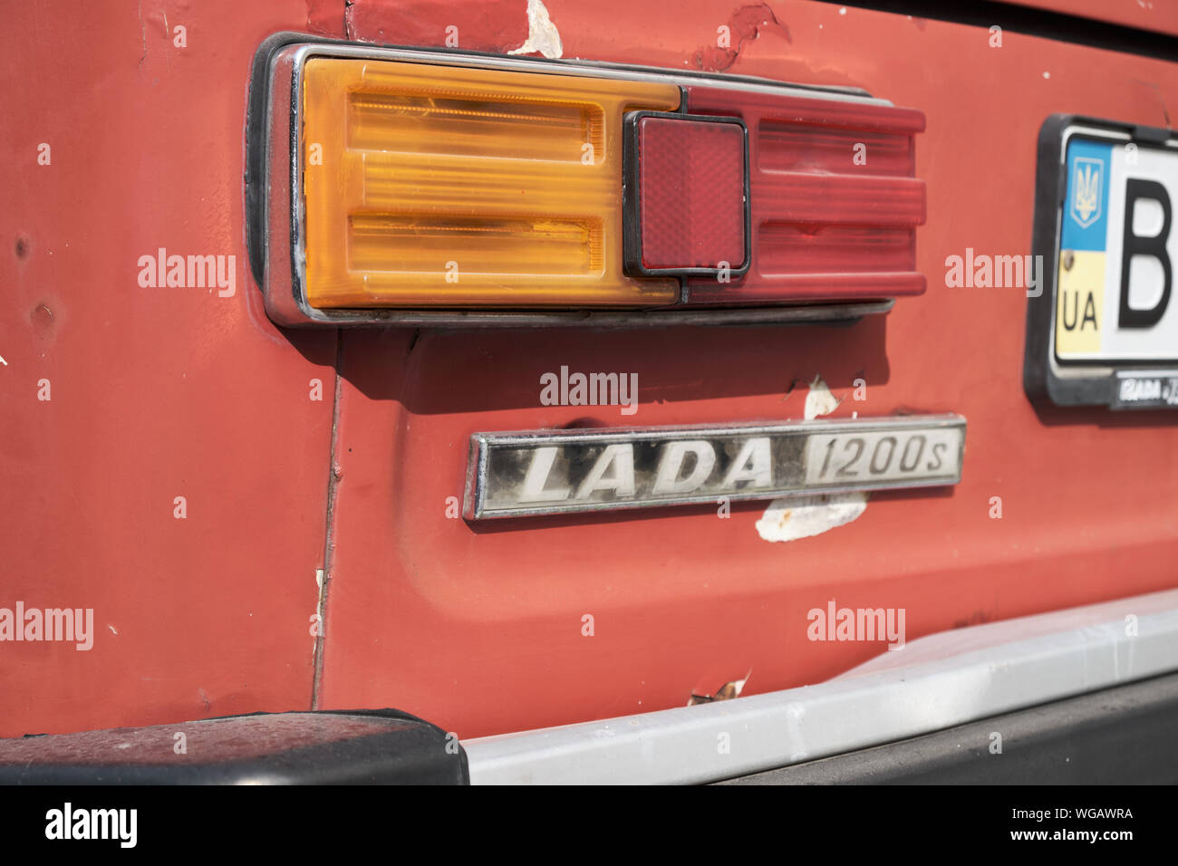 Close up of Lada 1200s name with Rear light and UA license label Stock Photo