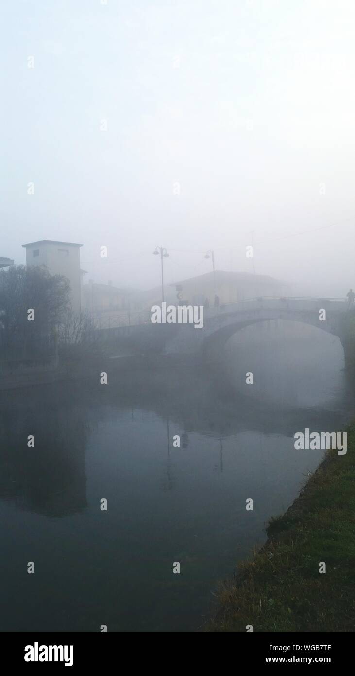 Scenic View Of River In Foggy Weather Stock Photo