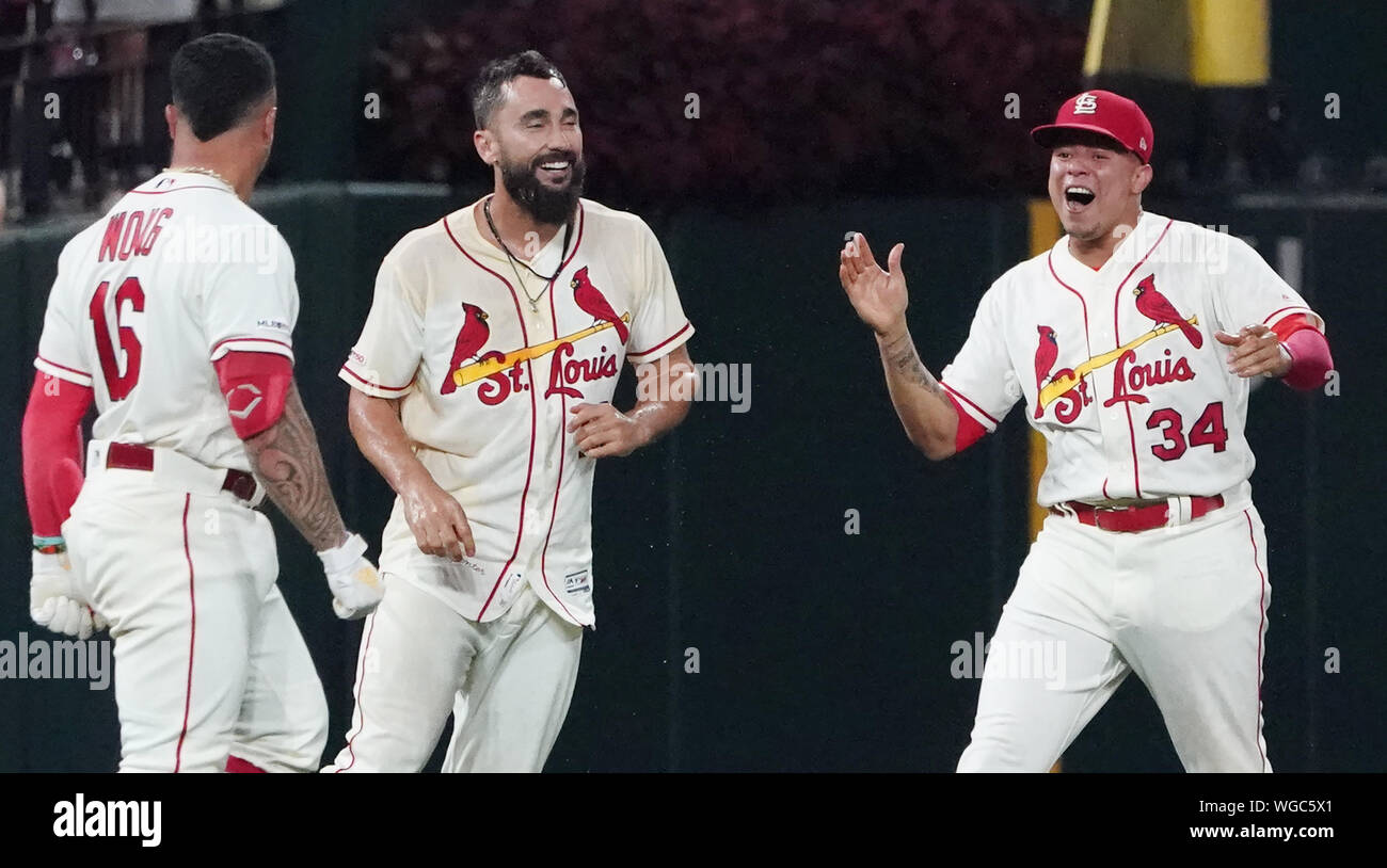St. Louis Cardinals Matt Carpenter (C) celebrates his game winning RBI single with Kolten Wong (L) and Yairo Munoz after being doused with Gatoraid, during the second game of a double header against the Cincinnati Reds at Busch Stadium in St. Louis on Saturday, August 31, 2019. St. Louis won the game 3-2. Photo by Bill Greenblatt/UPI Stock Photo