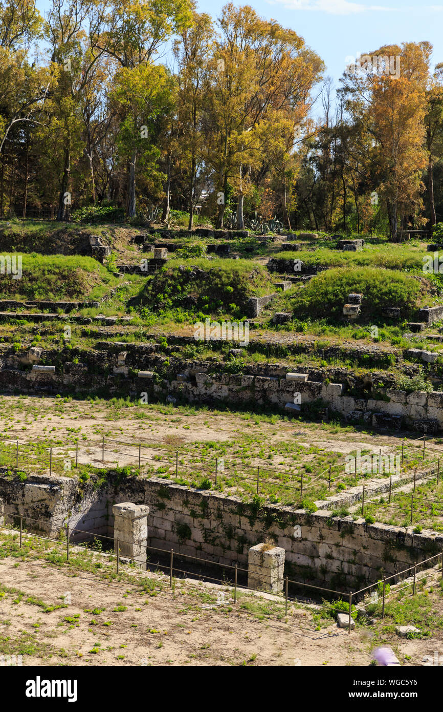 Old grown with grass stairs of Ancient ruins of Anfiteatro Romano Siracusa Stock Photo