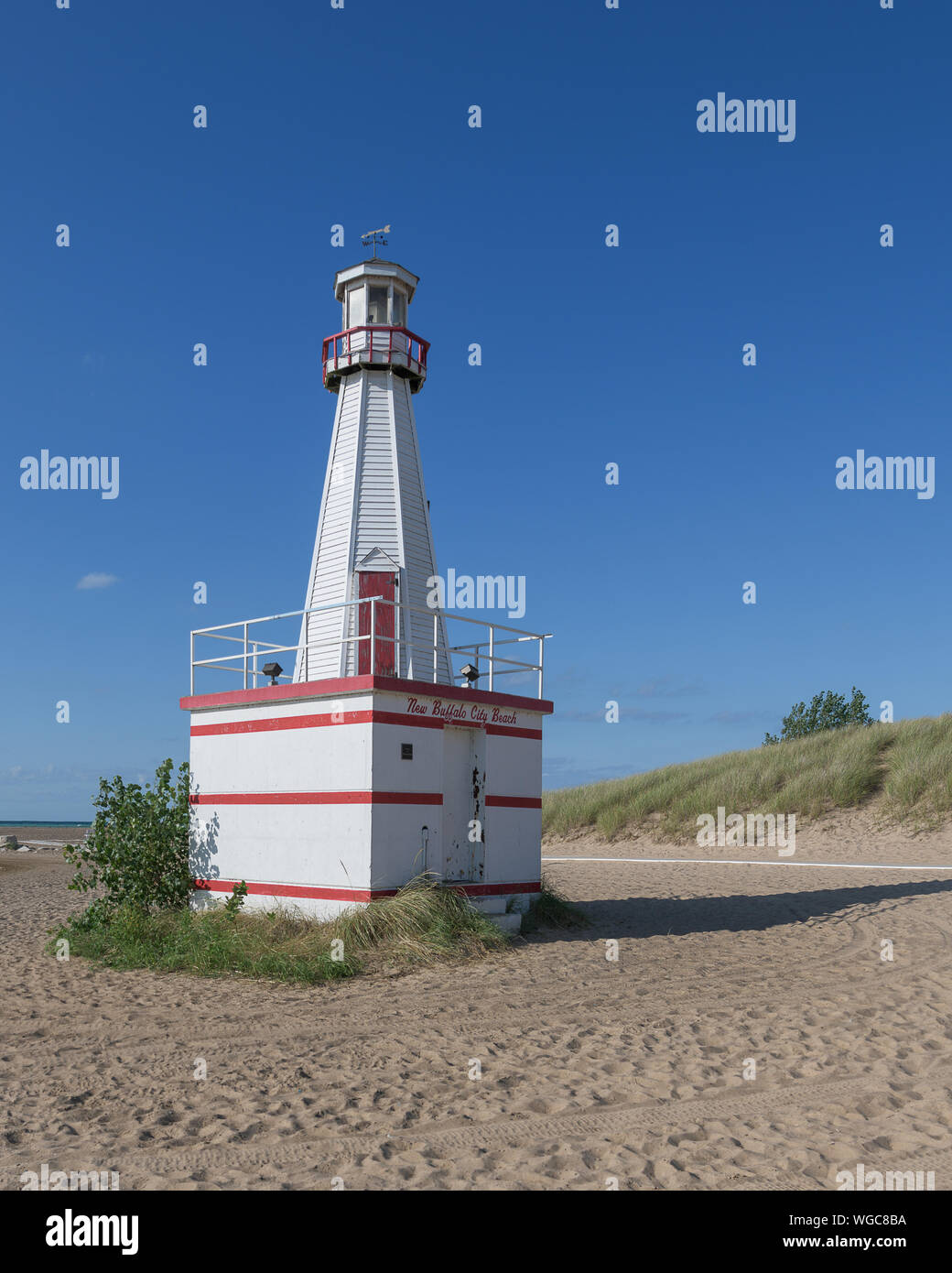 New Buffalo lighthouse and beach in New Buffalo, Michigan on sunny summer afternoon Stock Photo