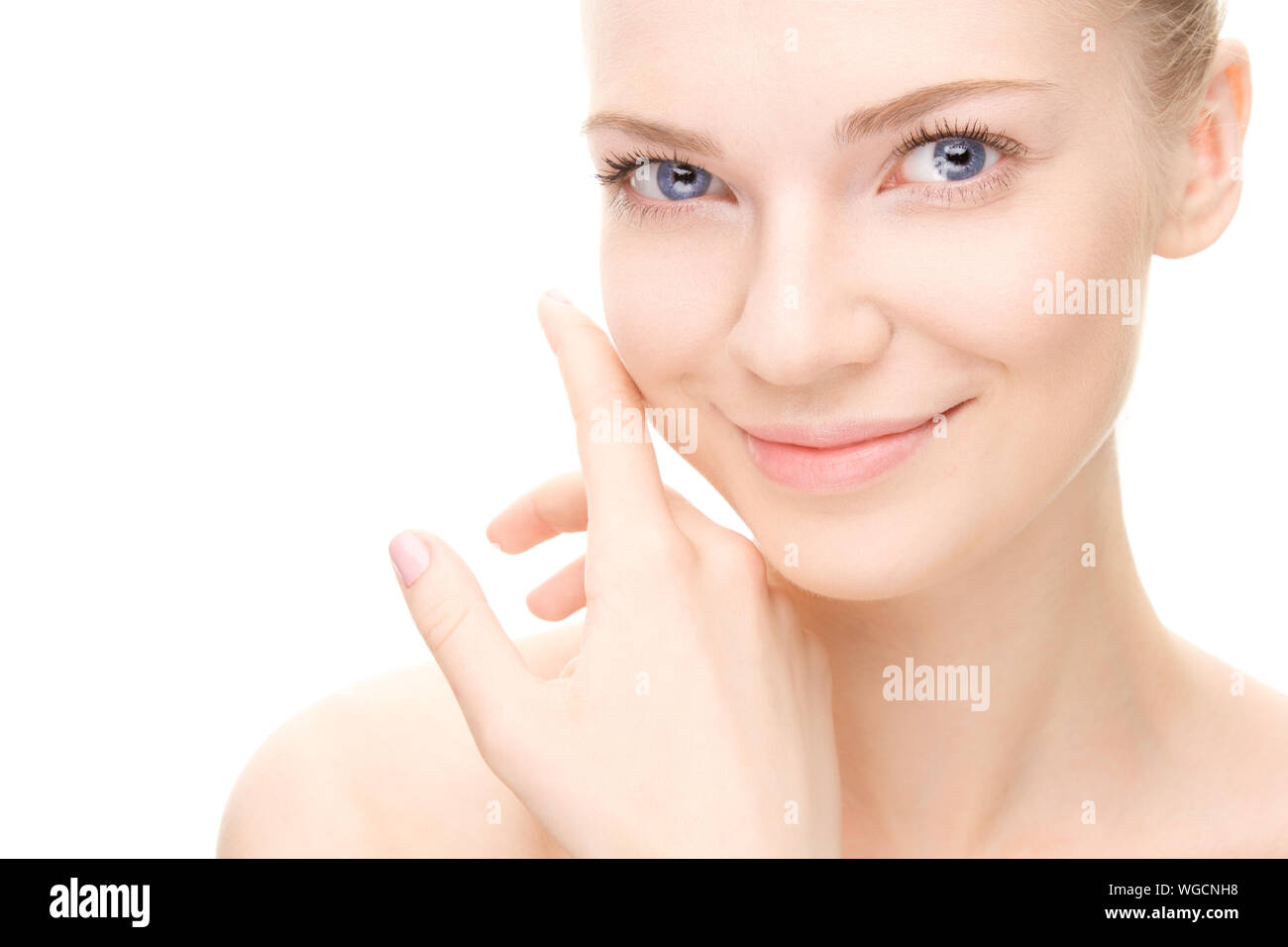 Young beauty woman portrait. Girl Touching her Face. Studio shot