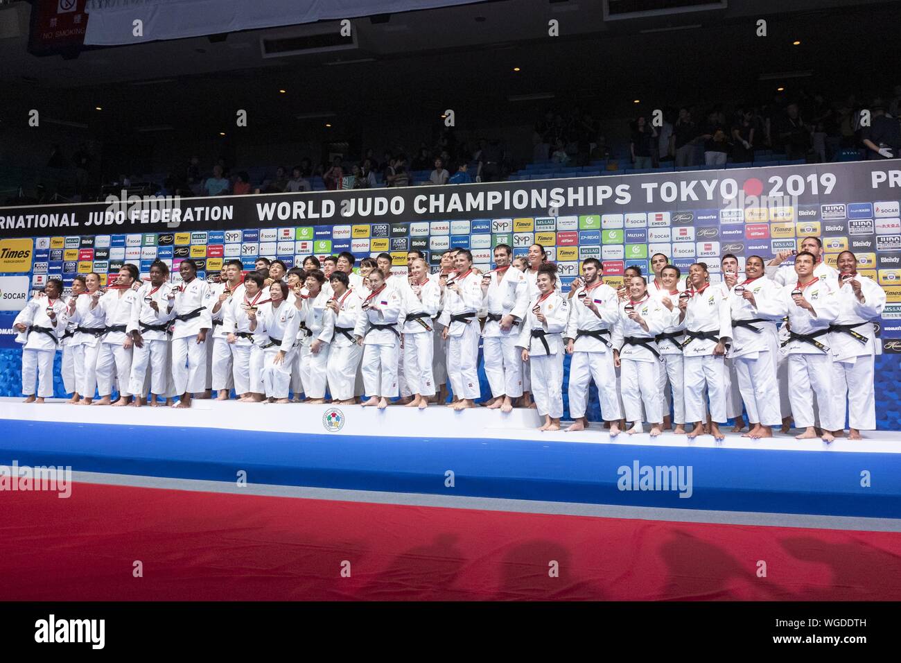 Tokyo, Japan. 1st Sep, 2019. (L to R) Silver medalists France team, gold medalists Japan team, bronze medalists Russia team and Brazil team, pose for the cameras during the award ceremony for the Mixed Team competition at the World Judo Championships Tokyo 2019 in the Nippon Budokan. The World Judo Championships Tokyo 2019 is held from August 25 to September 1st. Japanese Prime Minister Shinzo Abe, Tokyo Governor Yuriko Koike and Tokyo 2020 Olympic President Yoshiro Mori attended the final day of competitions and congratulated the winners during the award ceremony. (Credit Image: © Rodrigo Stock Photo