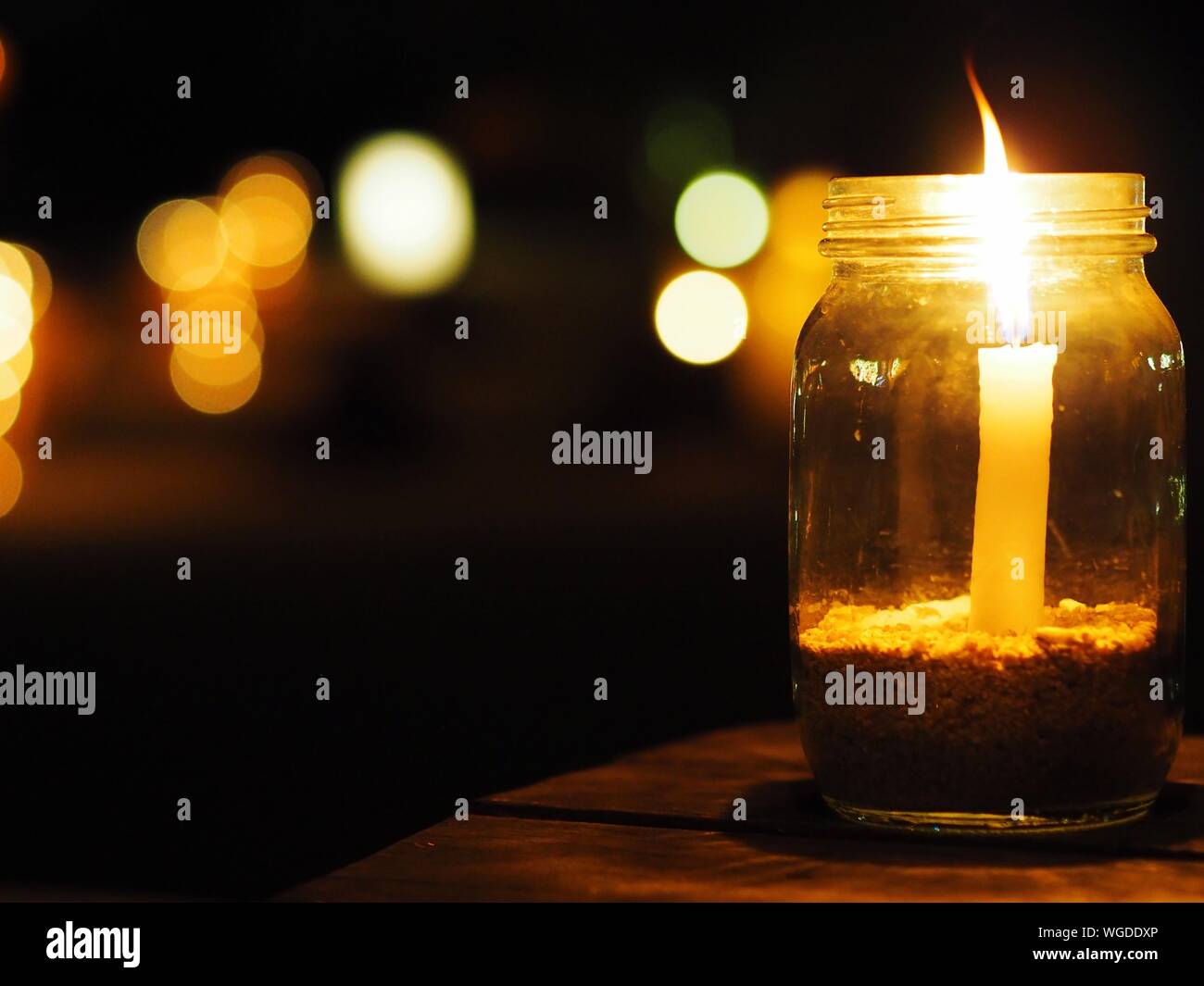 Burning candle in the jar hires stock photography and images Alamy