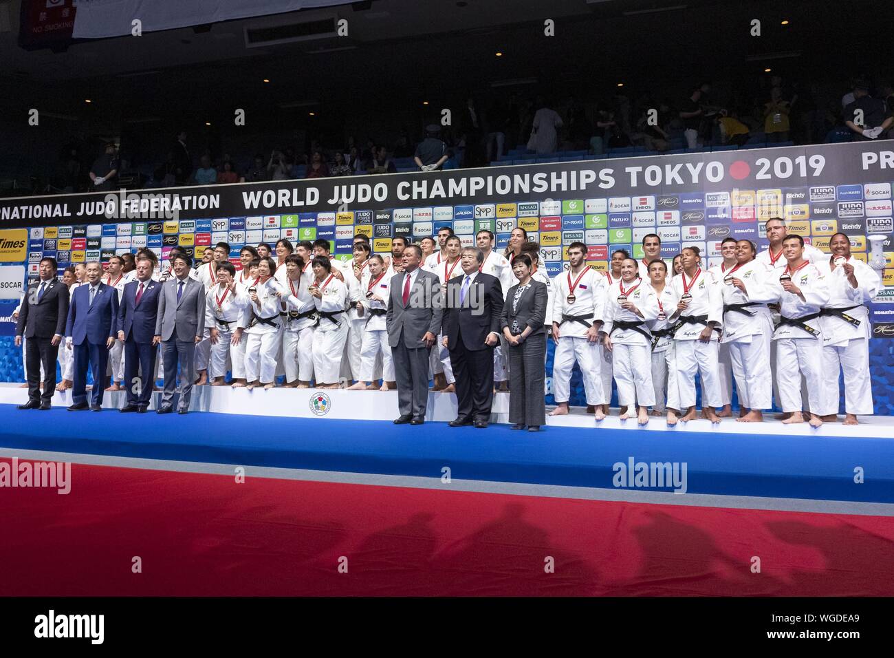 Tokyo, Japan. 1st Sep, 2019. (First line) Japanese Prime Minister Shinzo Abe (C-L), Tokyo Governor Yuriko Koike (R) and Tokyo 2020 Olympic President Yoshiro Mori (2nd - L) pose for the cameras with (2nd Line from L) silver medalists France team, gold medalists Japan team, bronze medalists Russia team and Brazil team, pose for the cameras during the award ceremony for the Mixed Team competition at the World Judo Championships Tokyo 2019 in the Nippon Budokan. The World Judo Championships Tokyo 2019 is held from August 25 to September 1st. Credit: Rodrigo Reyes Marin/ZUMA Wire/Alamy Live News Stock Photo
