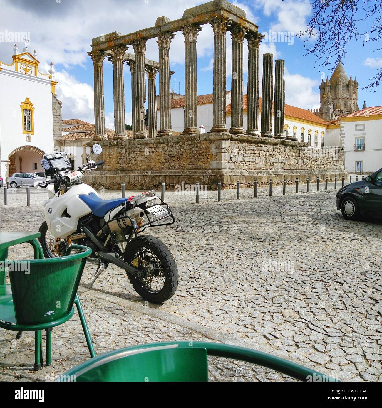 Motorcycle At Ancient Roman Temple In City Stock Photo