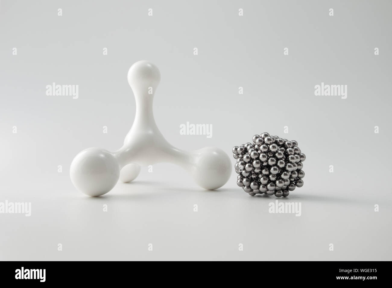 Close-up Of Metallic Molecules On White Background Stock Photo