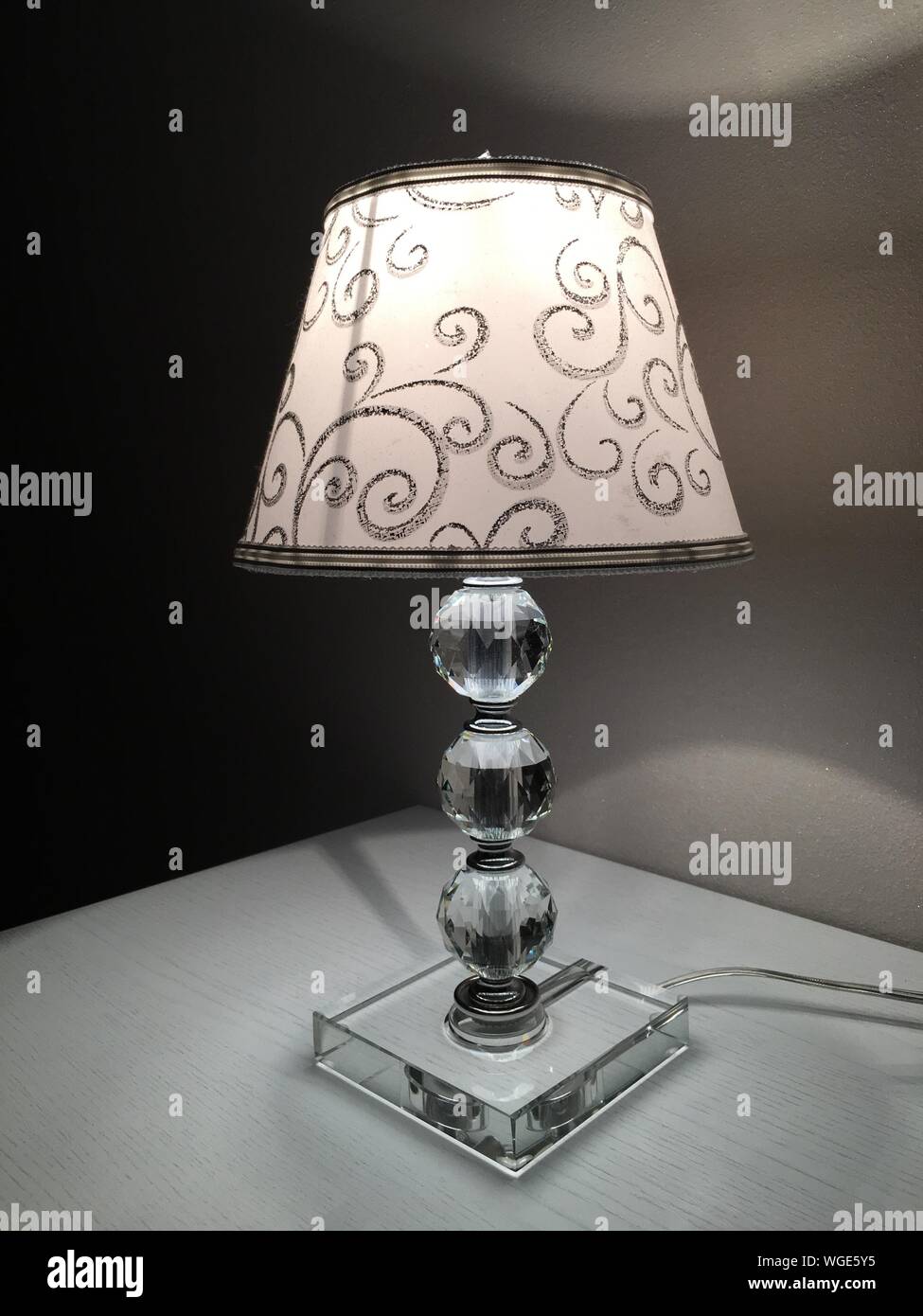 Illuminated Lamp On Side Table Stock Photo