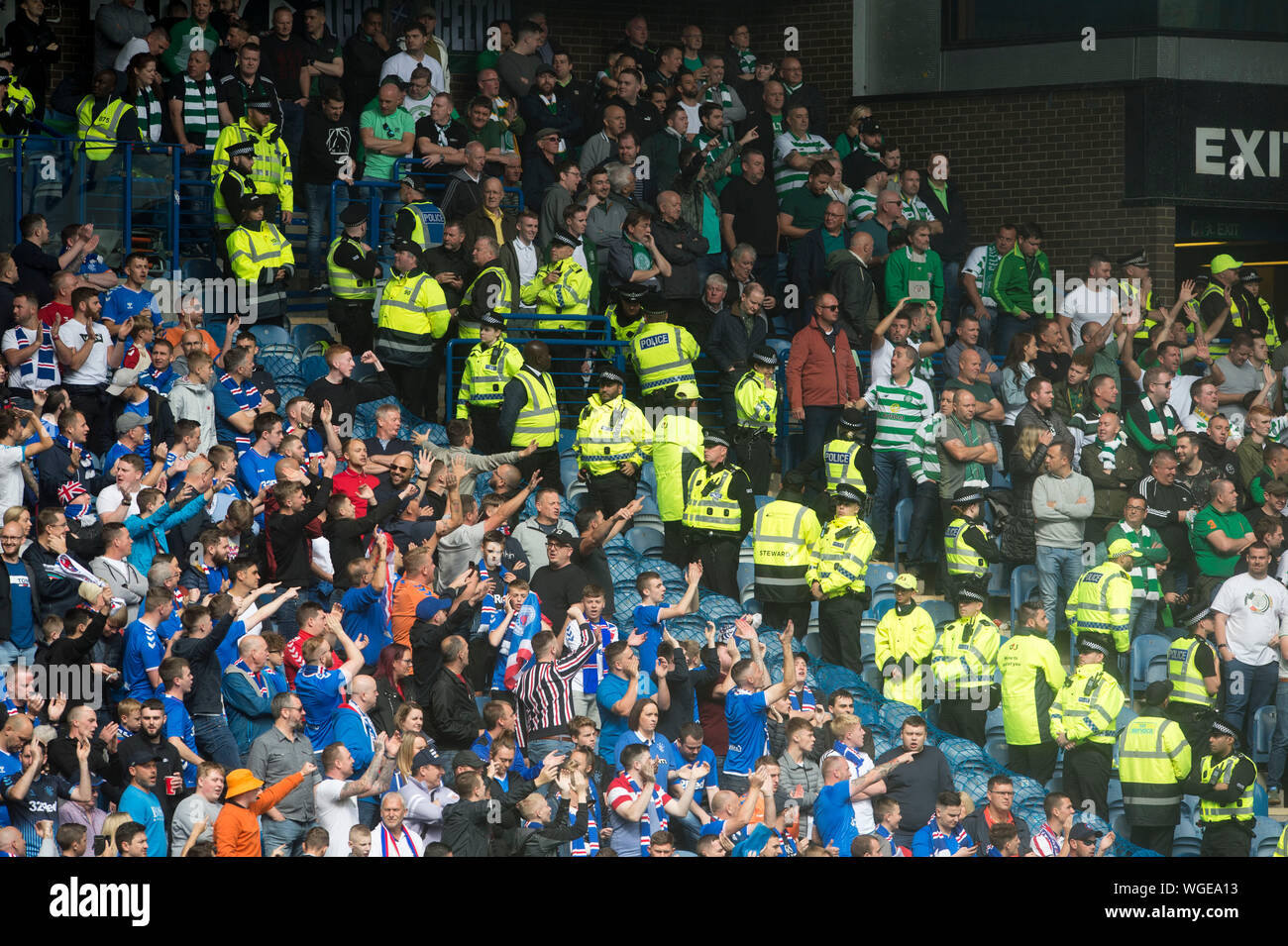 Rangers and Celtic fans segregated during the Ladbrokes Scottish Premiership match at Ibrox, Glasgow. Stock Photo