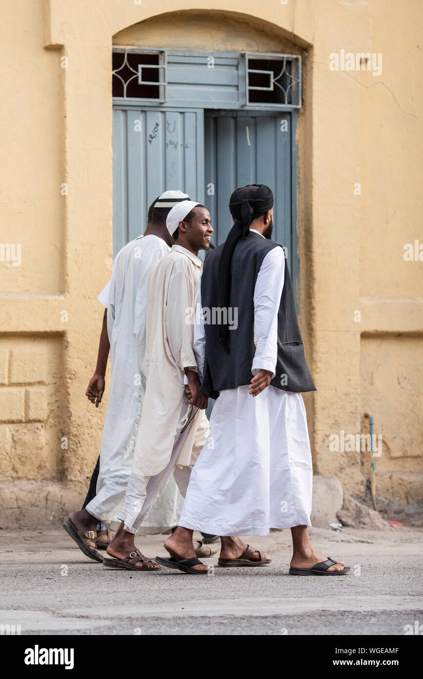DIRE DAWA, ETHIOPIA-APRIL 16, 2015: Unidentified Somali men walk down the street of Dire Dawa, Ethiopia, near the Somali border Stock Photo