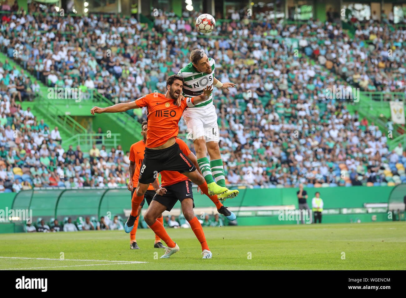 Tarantini of Rio Ave FC (L) vies for the ball with Sebastián Coates of Sporting CP (R) during the League NOS 2019/20 football match between Sporting CP vs Rio Ave FC.(Final score: Sporting CP 2 - 3 Rio Ave FC) Stock Photo