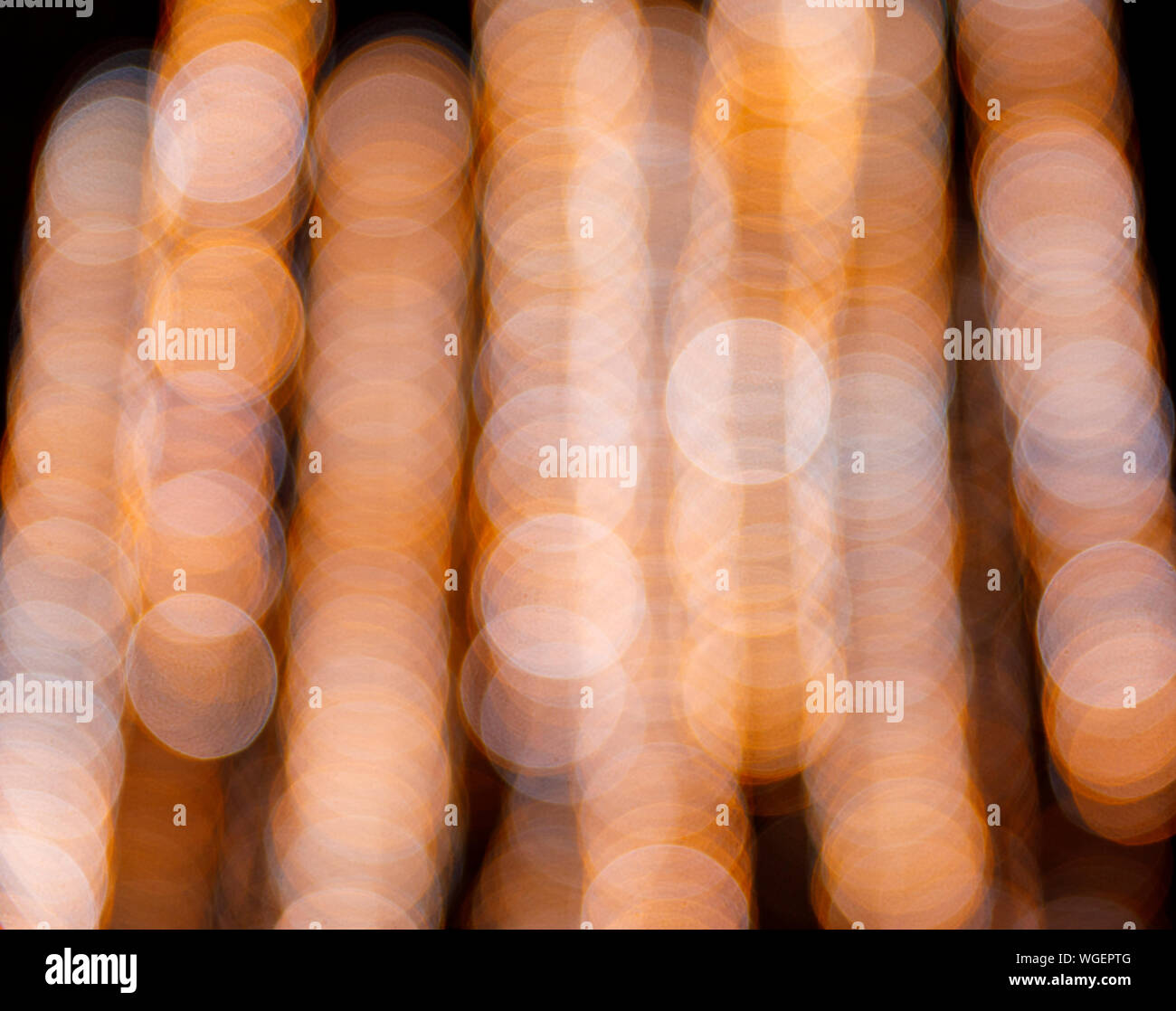Abstract background with bokeh or blurry round colorful light bubbles Stock Photo