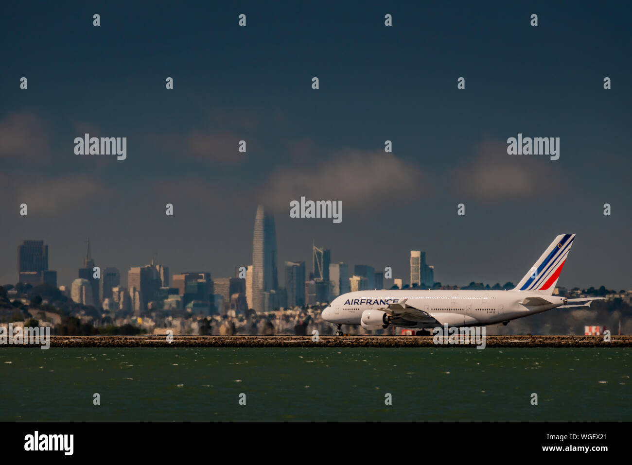 Air France A380 arriving San Francisco skyline in background Stock Photo