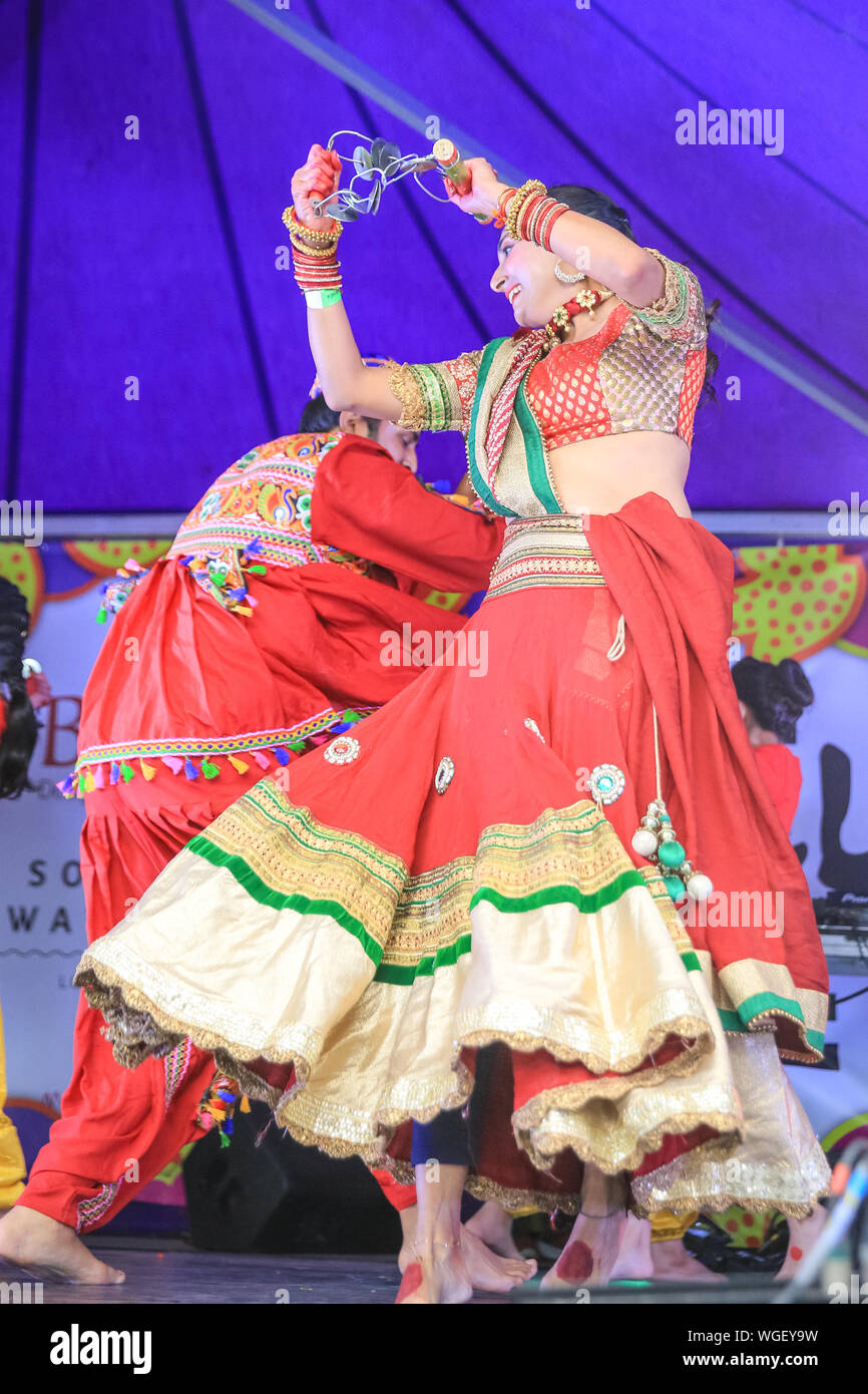 London, UK. 1st Sep 2019. Performers from the Foram Dance school, including children and adults, showcase Bollywood dancing, traditional Gujarati moves and much more at the London Mela, a festival showcasing Asian culture, dance, music and food in Southall Park, London. Credit: Imageplotter/Alamy Live News Stock Photo