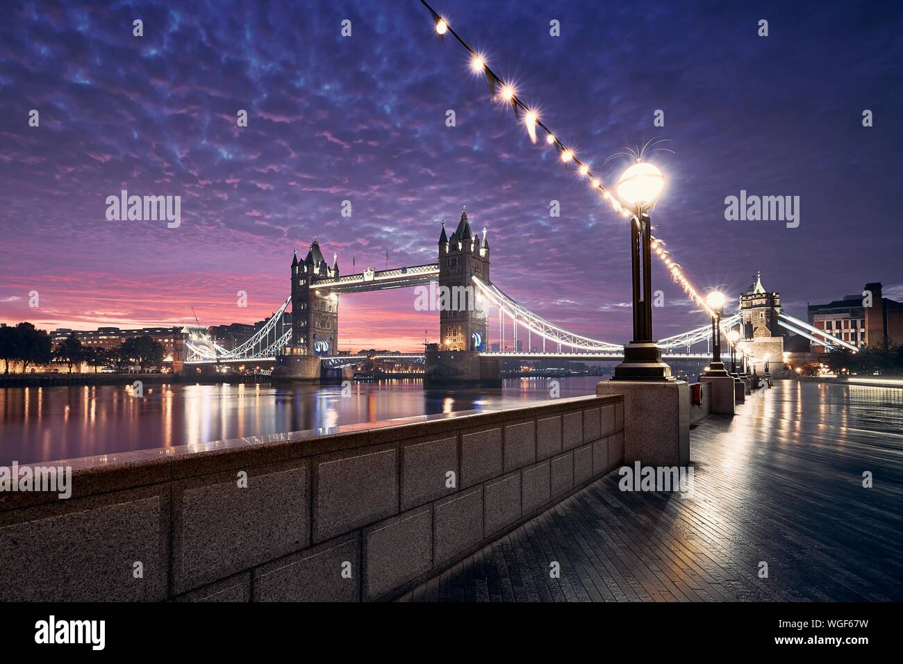 Popular travel destination - Tower Bridge against colorful sunrise. Cityscape of London, United Kingdom Stock Photo